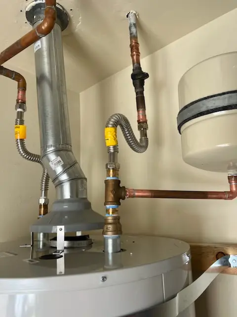 Water heater installation and plumbing repair in Newton Highlands